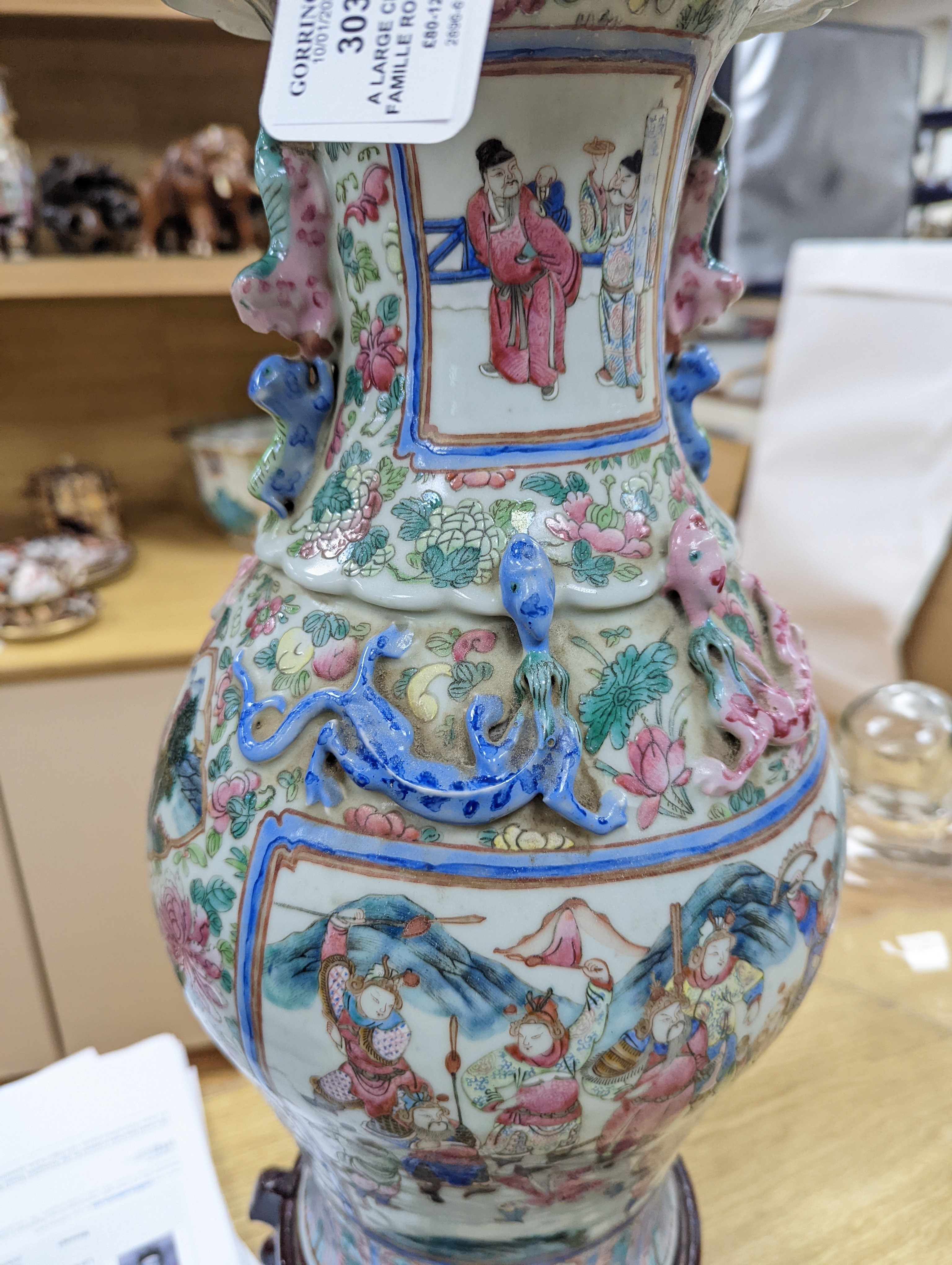 A large Chinese famille rose two handled vase, late 19th century, wood stand, restored 54cm incl stand